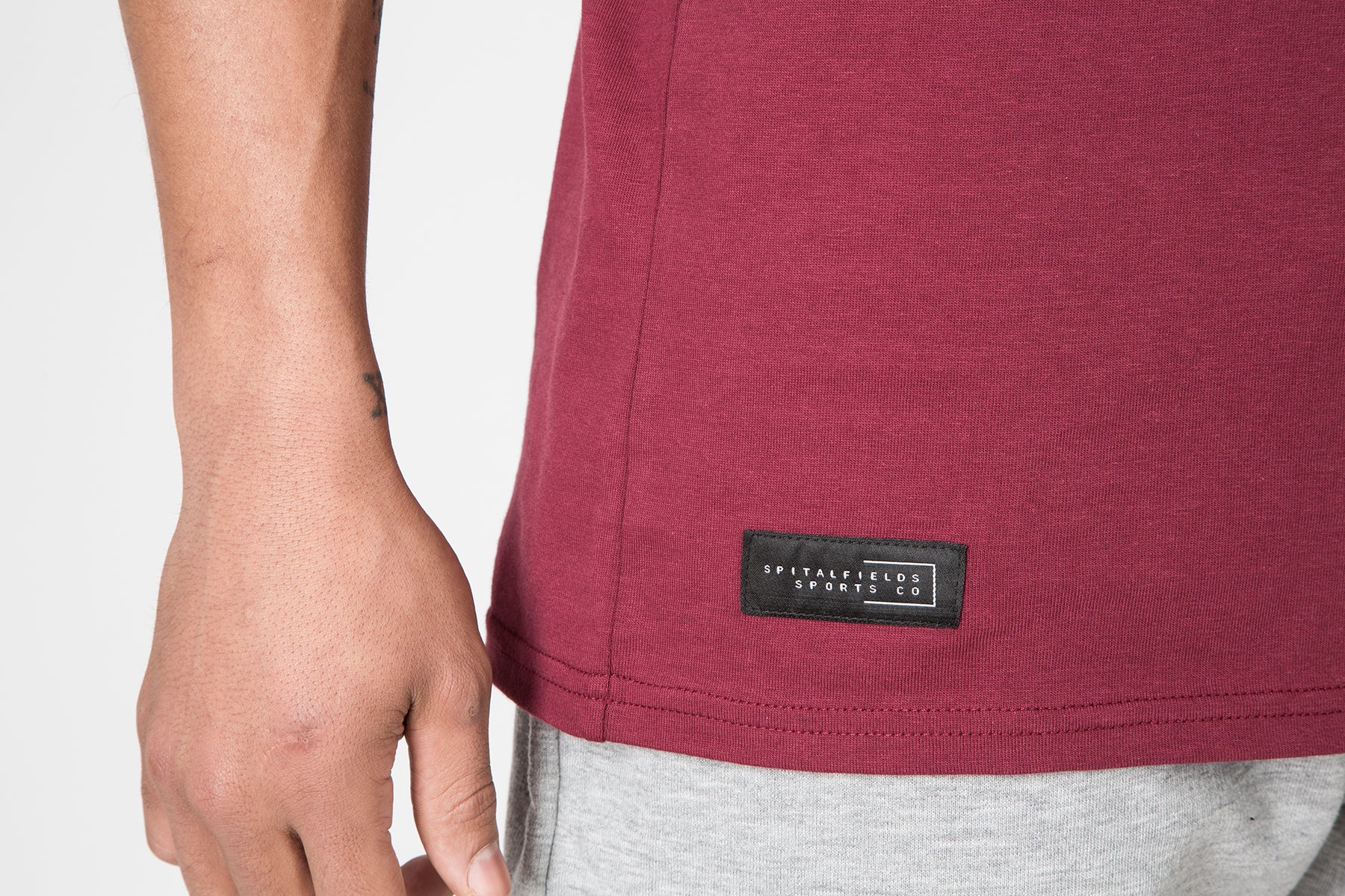 Racer Back Vest with Graphic Print in Burgundy